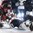PARIS, FRANCE - MAY 13: Canada's Mark Scheifele #55 crashes into Switzerland's Leonardo Genoni #63 while his teammate Ramon Untersander #65 looks on during preliminary round action at the 2017 IIHF Ice Hockey World Championship. (Photo by Matt Zambonin/HHOF-IIHF Images)
